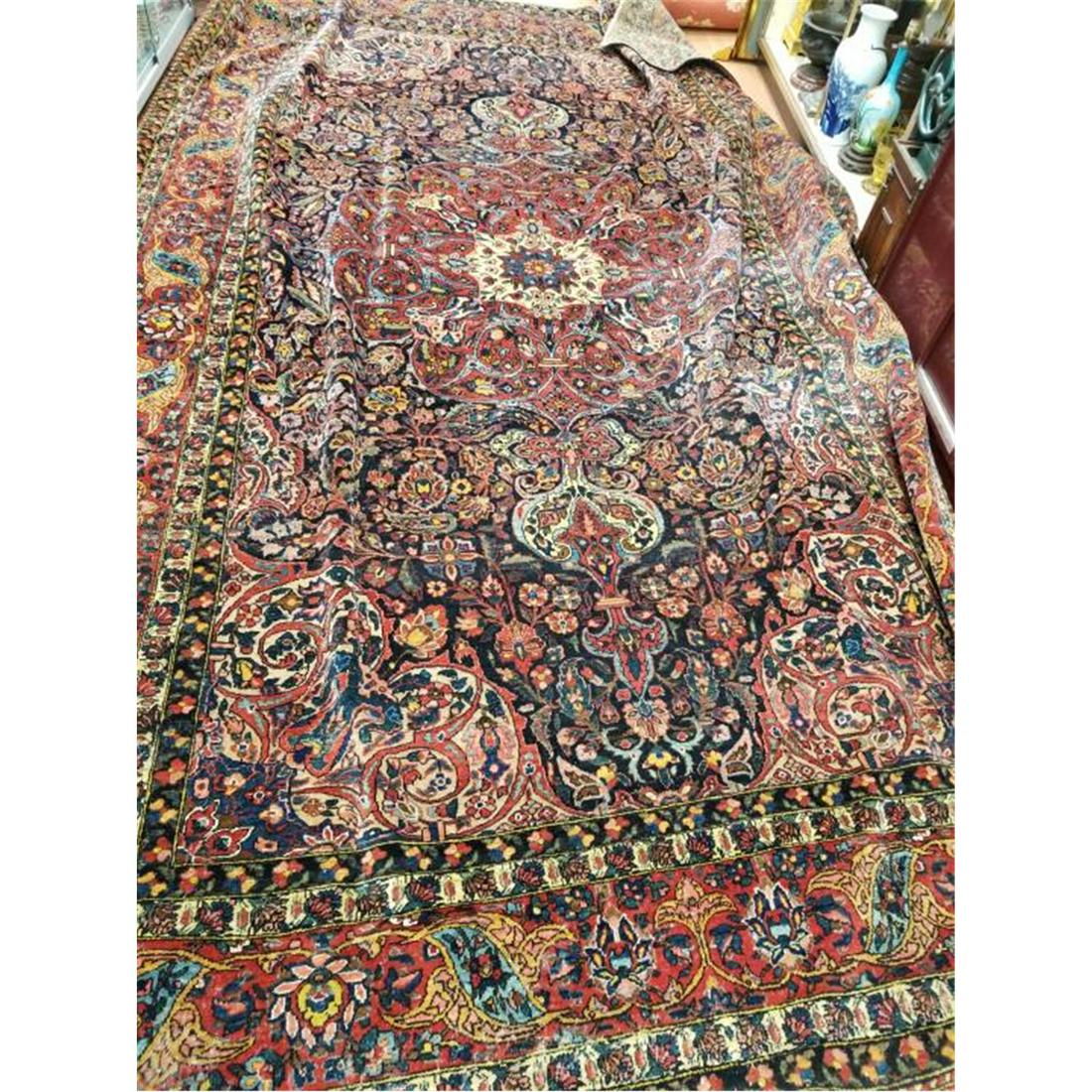 Large Antique Persian "Bidjar" Carpet.: Large Antique Persian "Bidjar" Carpet. Condition: Has Wear, Repair & Moth Damage. As Is. Dimensions: 12' x 18'. Provenance: From a Queens, NY Home. Please note the absence of a condition report does n