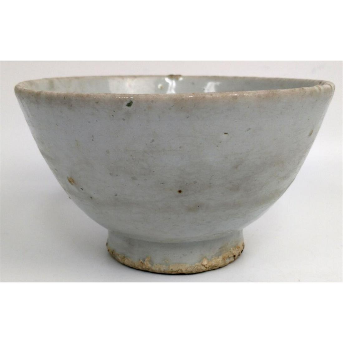 16th Century Korean Porcelain Bowl. "Yi Dynasty".: 16th Century Korean Porcelain Bowl. "Yi Dynasty". Condition: Generally Good Condition. Imperfections in the Making. No Chips or Repairs.Dimensions: Dia-6" x H-3.25".Provenance: From a New Jersey Colle