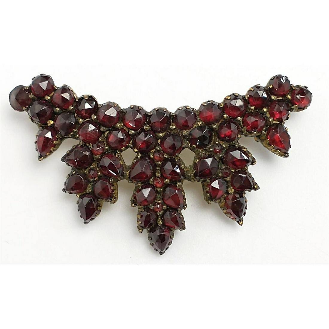 Bohemian Rose Cut Garnet Tiara Pin: Bohemian Rose Cut Garnet Tiara Pin. Condition: Generally Good Condition. Dimensions: L-1", W-1.75". Provenance: From a North Shore Long Island, NY Estate. Please note the absence of a condition report