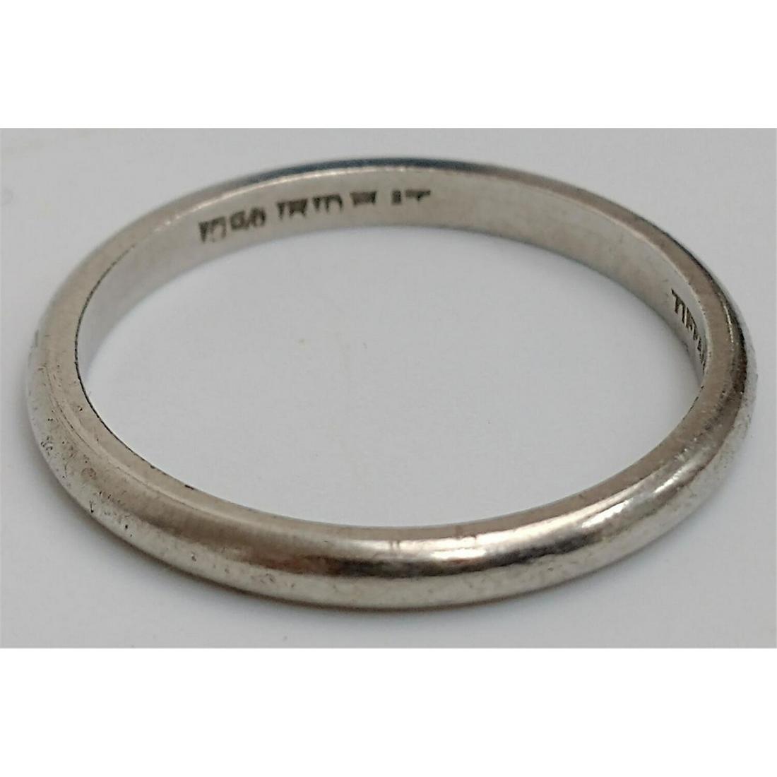 Tiffany & Co. Platinum Wedding Band: Tiffany & Co. Platinum Wedding Band. Fully Hallmarked.Condition: Generally Very Good Condition. Dimensions: Ring Size- 7.5. Total Weight: 3.6g./2.3dwt. Provenance: From a Queens, NY Home. Please note
