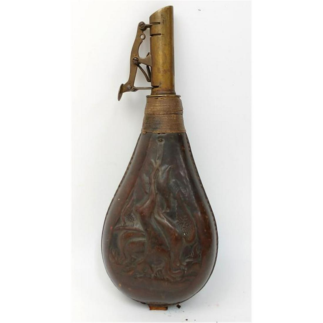 Antique Brass & Leather Black Powder Gun Flask.: Antique Brass & Leather Black Powder Gun Flask. Condition: As FoundDimensions: L-8"Provenance: From a New York City Estate.Please note the absence of a condition report does not imply that there are n