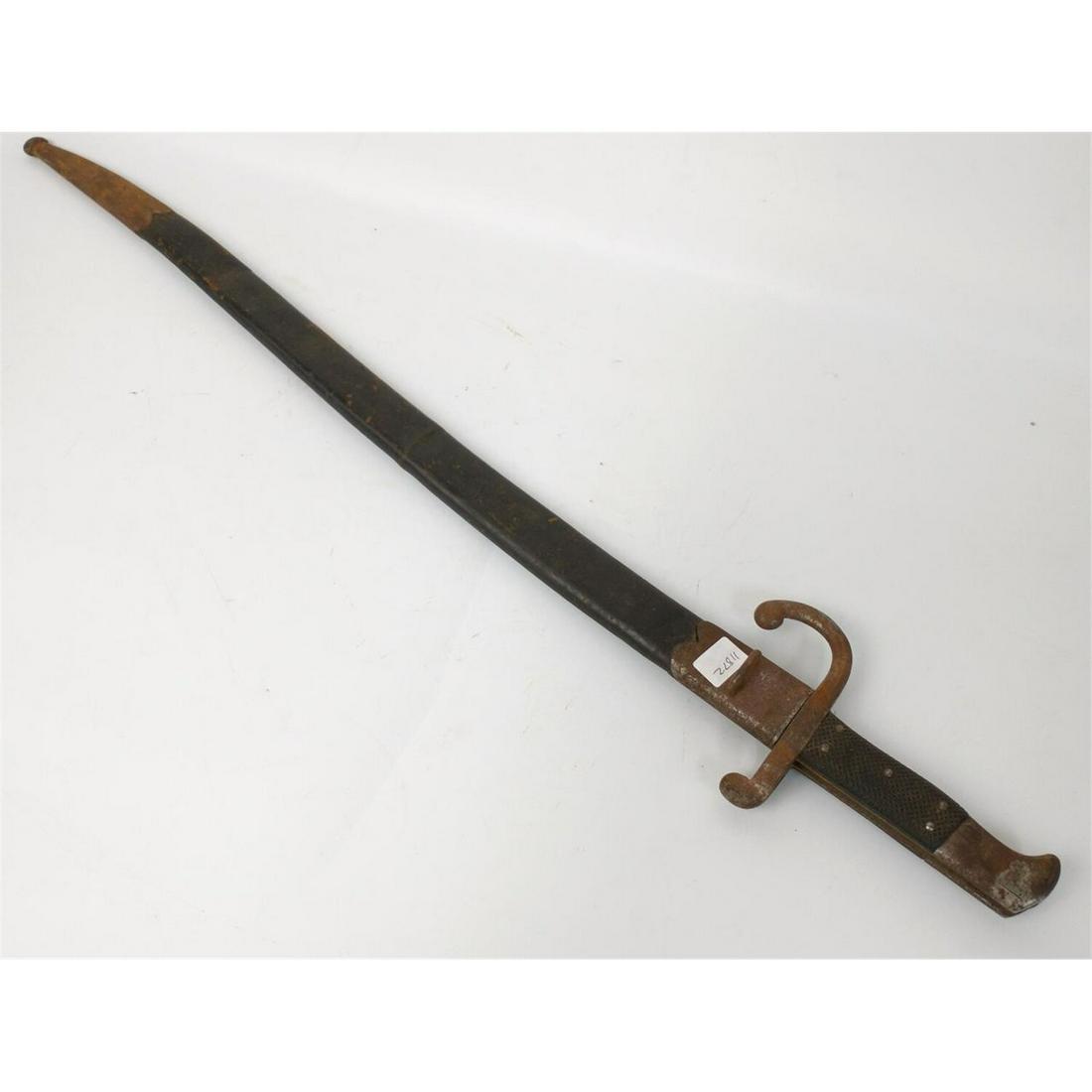 19thC Alex Coppell Solingin Long Rifle Bayonet: Antique 19thC Alex Coppell Solingin Long Rifle Bayonet w/ Leather Scabbard.Condition: As FoundDimensions: L-27.5"Provenance: From a New York City Estate.Please note the absence of a condition report d