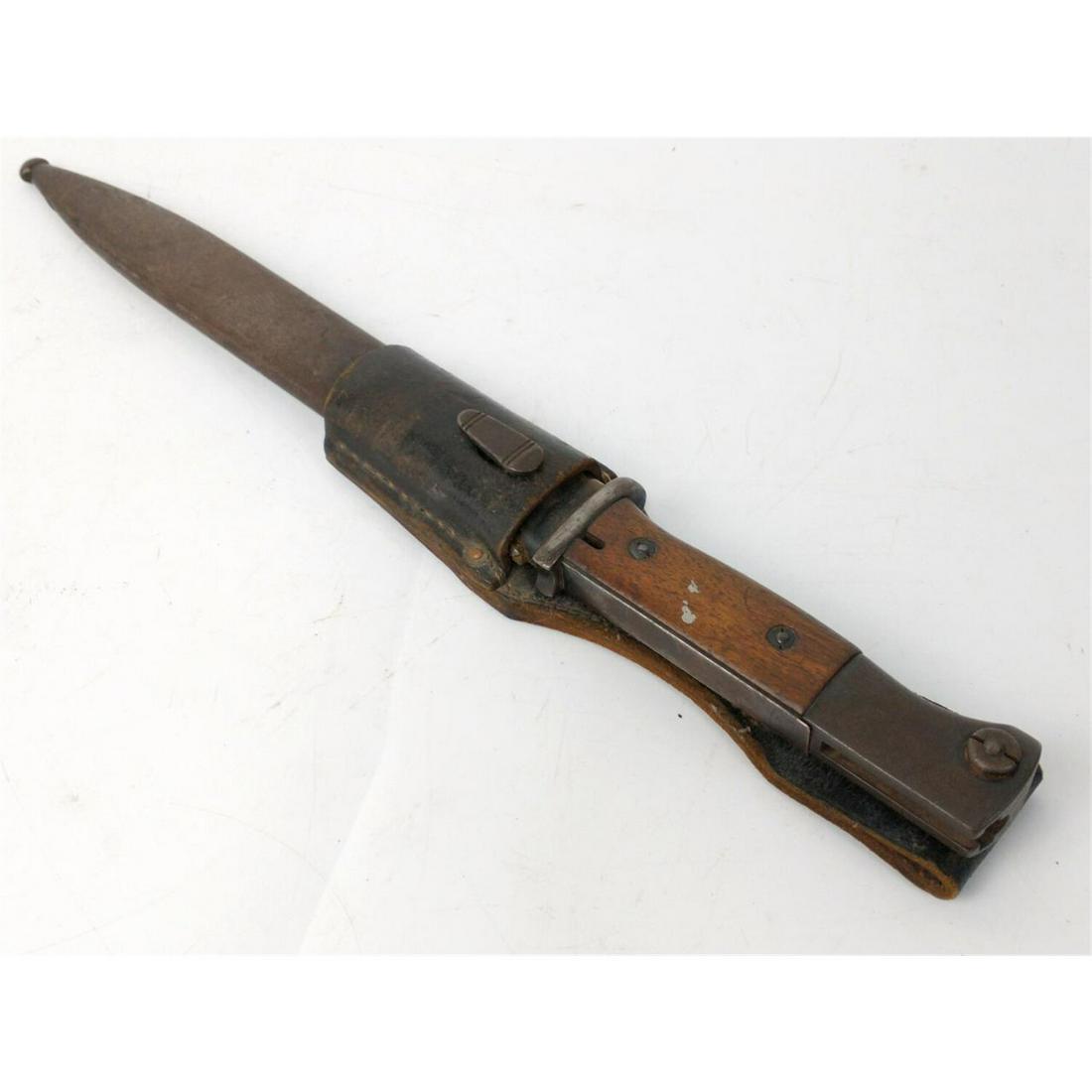 WWII German K98 Rifle Bayonet w/ Scabbard: WWII German K98 Rifle Bayonet w/ Scabbard & Leather Frog. Matching Numbers 4535 b. Condition: As FoundDimensions: L-16" Approx. Provenance: From a New York City Estate. Please note the absence of a co