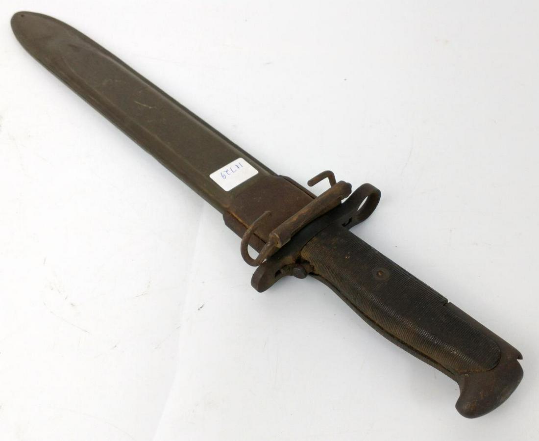 WWII US UFH Rifle Bayonet w/ Scabbard.: WWII US UFH Rifle Bayonet w/ Scabbard.Condition: As FoundDimensions: L-16"Provenance: From a New York City Estate. Please note the absence of a condition report does not imply that there are no condit