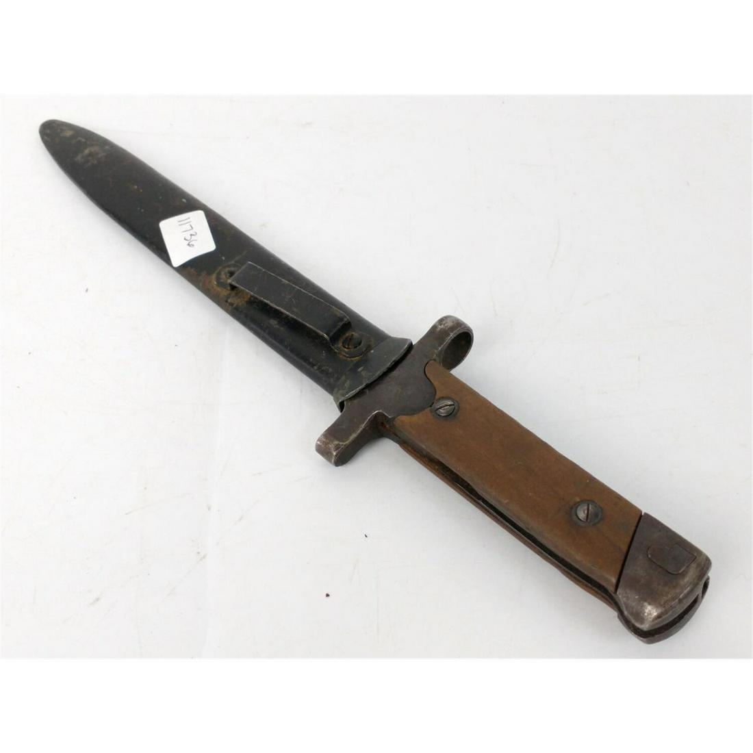 WWII Bayonet Possibly European Paratrooper.: WWII Bayonet w/ Scabbard. Possibly European Paratrooper. Condition: As FoundDimensions: L-12".Provenance: From a New York City Estate. Please note the absence of a condition report does not imply that