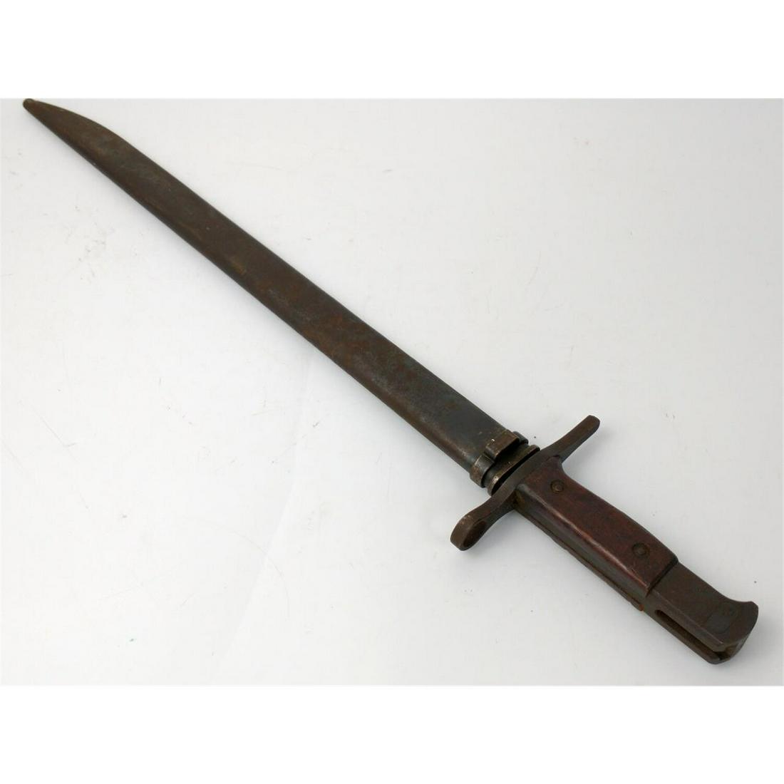 WWII Japanese Arisaka Bayonet w/ Scabbard.: WWII Japanese Arisaka Bayonet w/ Scabbard.Condition: As FoundDimensions: L-21"Provenance: From a New York City Estate. Please note the absence of a condition report does not imply that there are no co