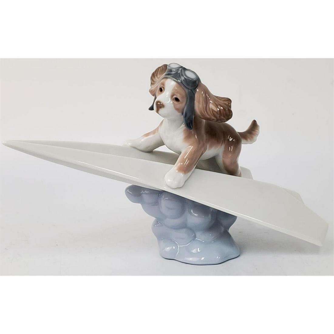 Lladro Figurine #6665 "Lets Fly Away": Lladro Figurine #6665 "Lets Fly Away" Circa 2000 With Original BoxCondition: Generally Very Good ConditionDimensions: L-7.75"Provenance: From a Long Island NY Collection.Please note the absence of a c