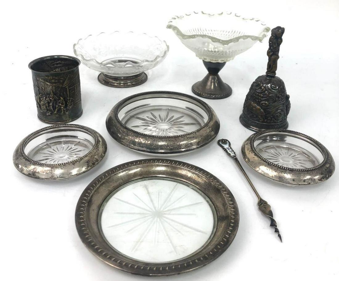 9 Vintage Sterling & Silver Plated Glass Items: Lot of 9 Vintage Sterling & Silver Plated Metal & Glass Items. Including Bowls, Coasters, Cup, Bell & Enameled Utensil. Condition: Generally Good Condition, Needs Polishing. Dimensions: Footed Glass B