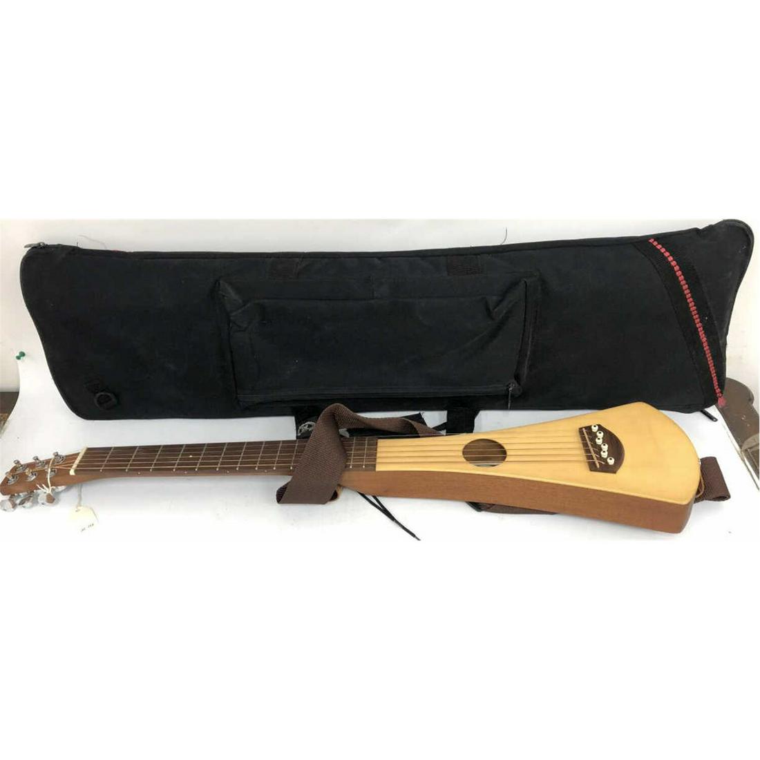 Vintage Martin Guitar Co. "The Backpacker" (1 of 2)