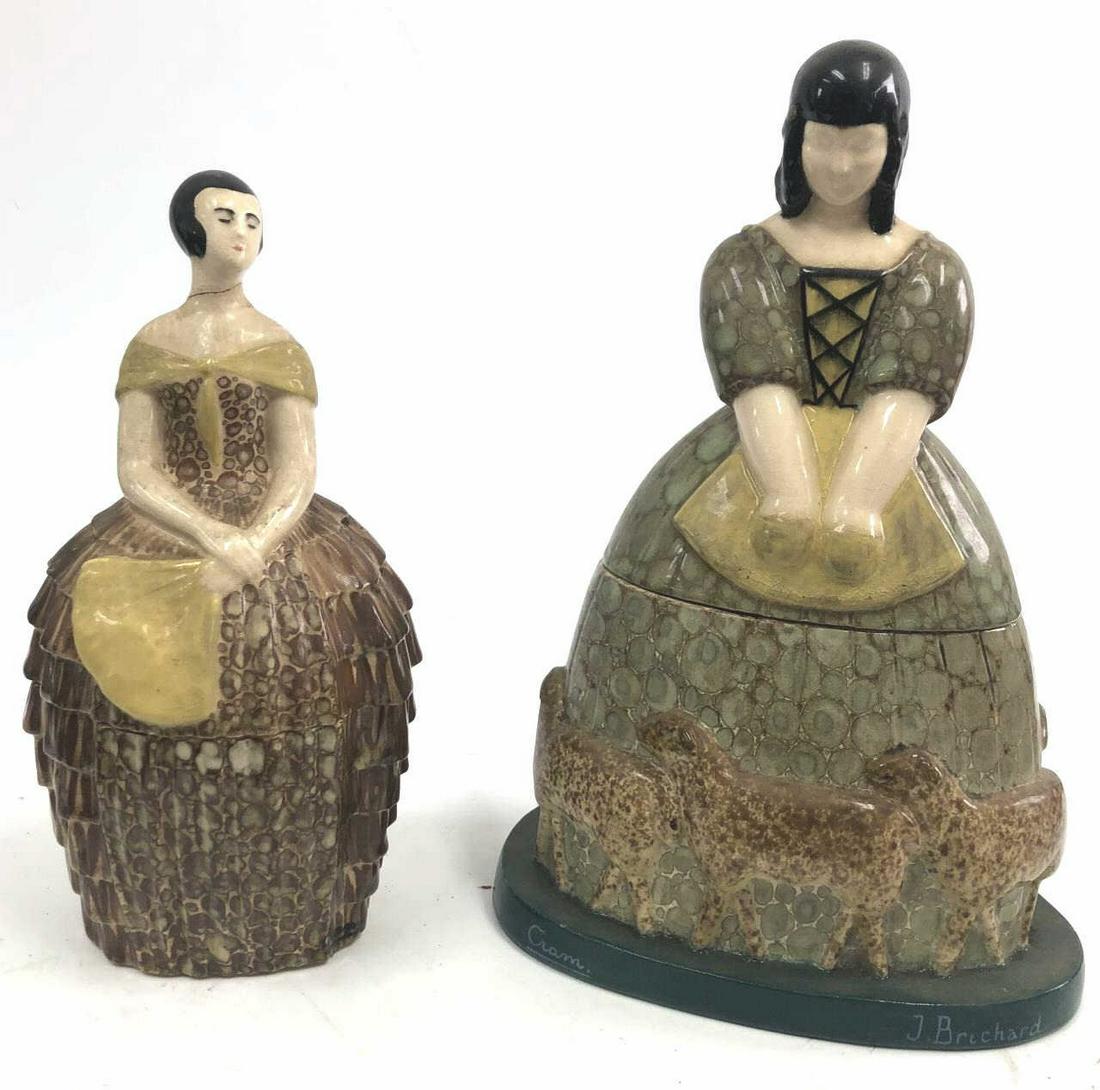 2 French Porcelain Covered Jars of Women: 2 French Porcelain Covered Jars of Women with Markings Cram. and J. Brichard. Condition: Generally Good Condition, One has a Crack in her Neck and Some Chips Along the Rims. Dimensions: H-10.75". Prov