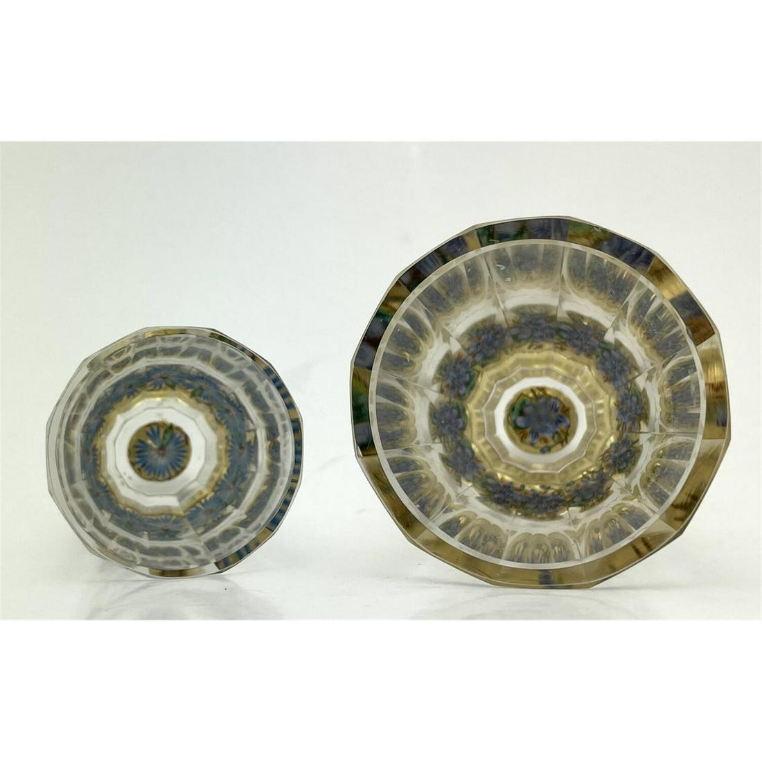 Two Antique Bohemian Shot Glasses: Two Antique Bohemian Shot Glasses with Kaleidoscopic Flower Effect. Condition: Excellent Condition. No Chips, Cracks, or Repairs. Dimensions: Largest H: 2.6".Provenance: From a Sutton Place Manhattan 