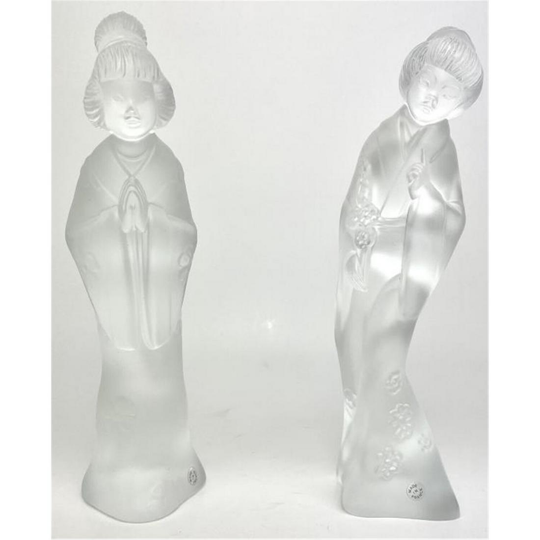 2 Lladro Crystal Glass Geisha Figures, French Made: 2 Lladro Crystal Glass Geisha Figures. Designed by Salvador Debon. Issued in 1983. Manufactured in France.Condition: Excellent. No Chips or Cracks. Dimensions: H: 8". Provenance: From a Long Island, N