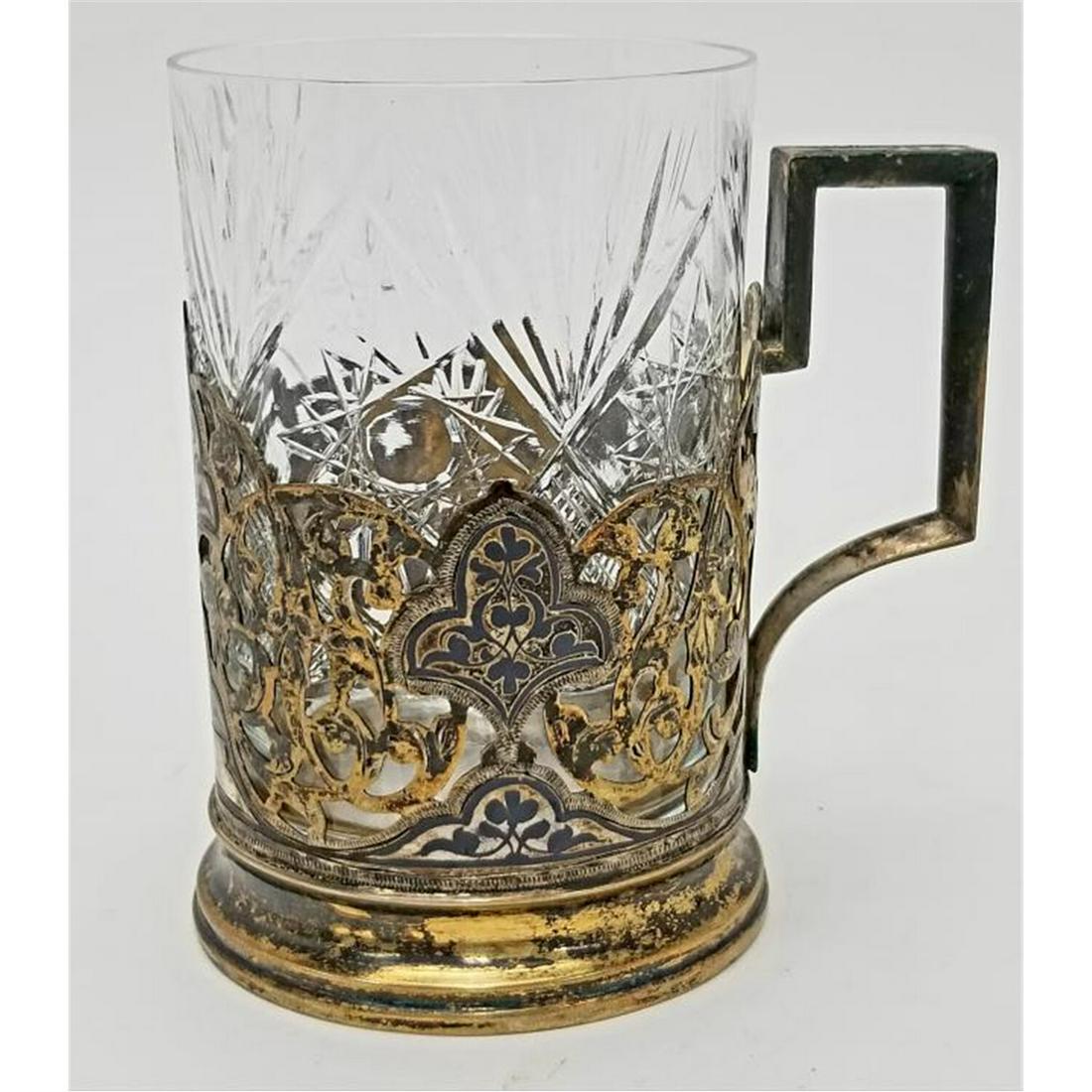 Russian Neillo Silver and Cut Glass Tea Cup: Russian Neillo Silver and Cut Glass Tea Cup. Fully Hallmarked.Condition: Generally Very Good Condition. Tarnished, Needs Cleaning.Dimension: H-4.1" Dia- 3.75". Weight: Weighable Silver- 2.75 ozt / 85.