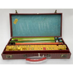 Mah Jong Set in Orig. Case. Bakelite Tiles, Racks: Old Mah Jong Set in Original Case. Bakelite Tiles & Racks. Condition: Generally Good. Dimensions: Case L: 19.5" x W: 9" x D: 3.5". Provenance: From a Long Island, NY Estate.Please note the absence of