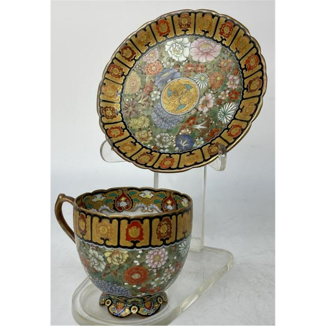 Japanese Kutani Eggshell Porcelain Cup and Saucer: Exceptional Antique Japanese Kutani Eggshell Porcelain Cup and Saucer Signed by Utsukushi Yamasei.Condition: Cup had old crack, saucer is in excellent condition. Dimensions: Cup H- 2.4" Saucer Dia- 4.