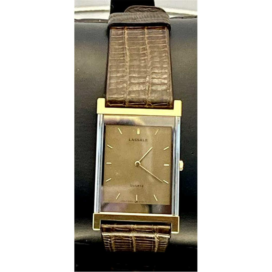 Lassale Quartz Watch: Lassale Quartz Watch Condition: Generally Very Good Condition. Please Note: We Cannot Guarantee the Workability or Mechanism of Any Vintage or Old Watches or Clocks.Dimension: 1.25" x .75". Provenance