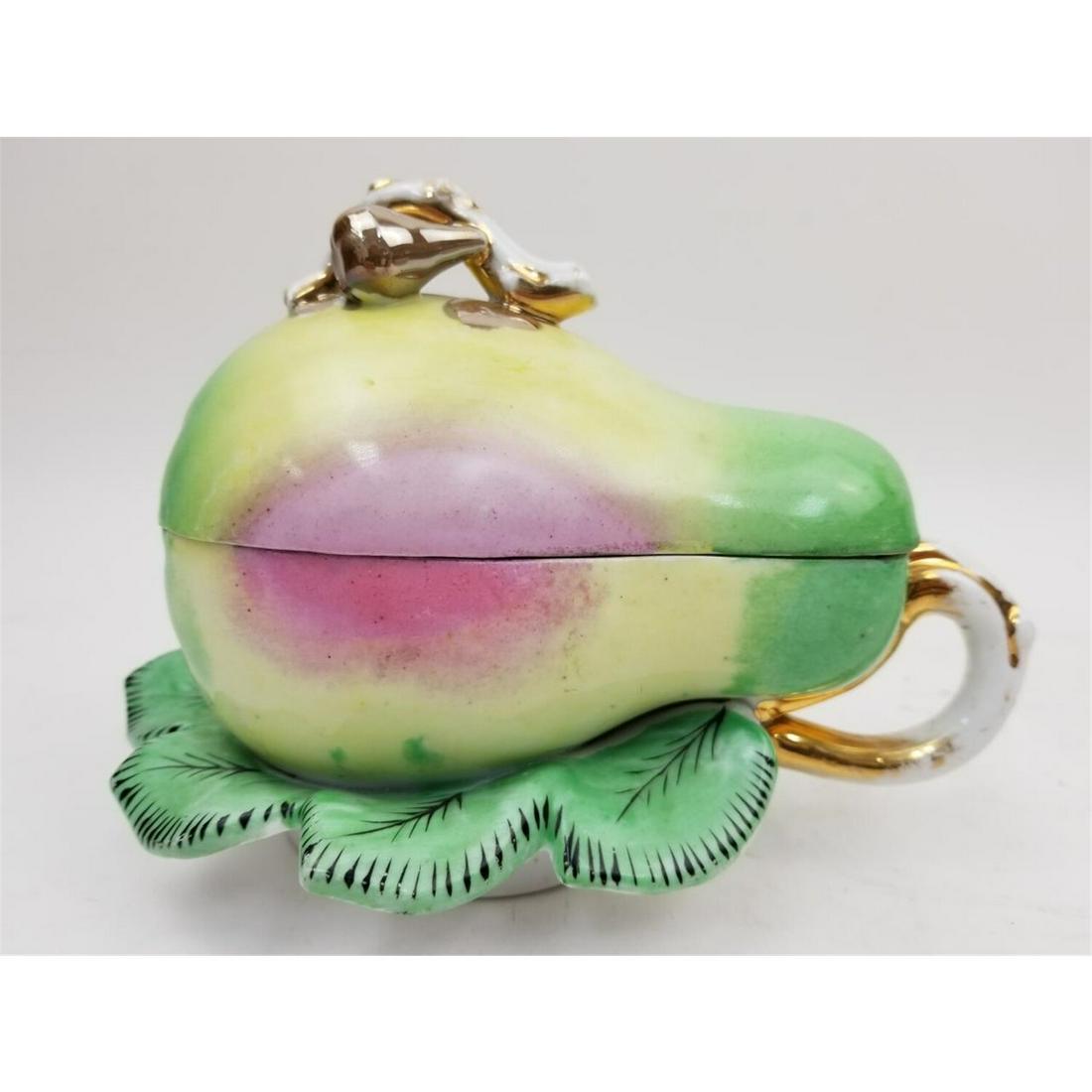 Russian Antique Pear Shaped Porcelain Box: Russian Antique Pear Shaped Porcelain Box. Fully Signed.Condition: Generally Good.Dimensions: L- 7.5" W-5" H-5".Provenance: From a Long Island NY Home. Please note the absence of a condition report do