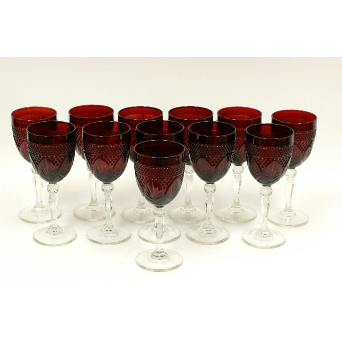 12 Red and White Glass Wine Goblets: 12 Wine Goblets, Ruby Red Glass Top, Clear Glass Bottom. Condition: Generally Good Condition.Dimensions: H-8" x Dia-3"Provenance: From a Long Island, NY Home.Please note the absence of a condition rep