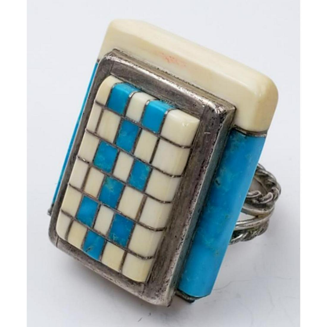 Native American Sterling Silver and Turquoise Ring: Unusual Native American Signed "Owl" Sterling Silver and Inlaid Turquoise and Bone Ring.Condition: Generally Very Good.Dimension: Ring Size-6, Top-1.2" x 1". Weight: 23 g. Provenance: From a Private C