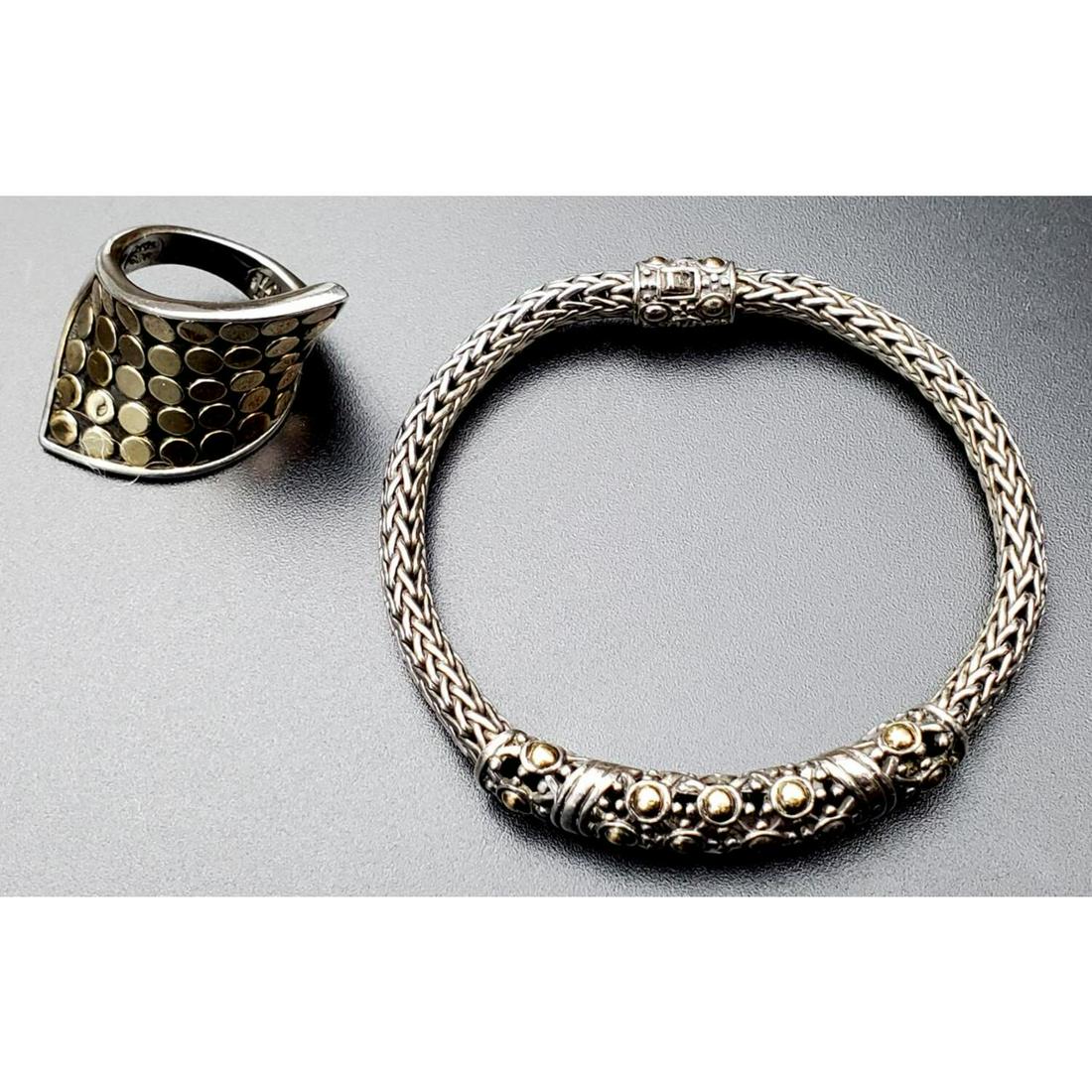 2 John Hardy 18K Gold and Sterling Silver Items: 2 John Hardy 18K Gold and Sterling Silver Items Including Modernistic Ring and Bracelet. Fully Hallmarked. Condition: Excellent. Dimensions: Bracelet Dia- 2.25", Ring Size- 7". Weight: 43.5 g. Provena