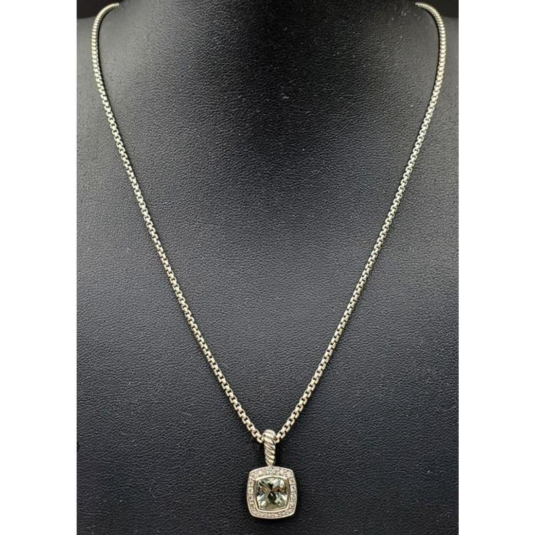 David Yurman Silver/ Prasiolite/ Diamonds Necklace: David Yurman Silver Necklace with Prasiolite and Diamonds Pendant. Condition: Excellent. Dimensions: L- 14", Pendant- 0.5" x 0.5". Weight: 9.2 g. Provenance: From a Long Island, NY HomePlease note the
