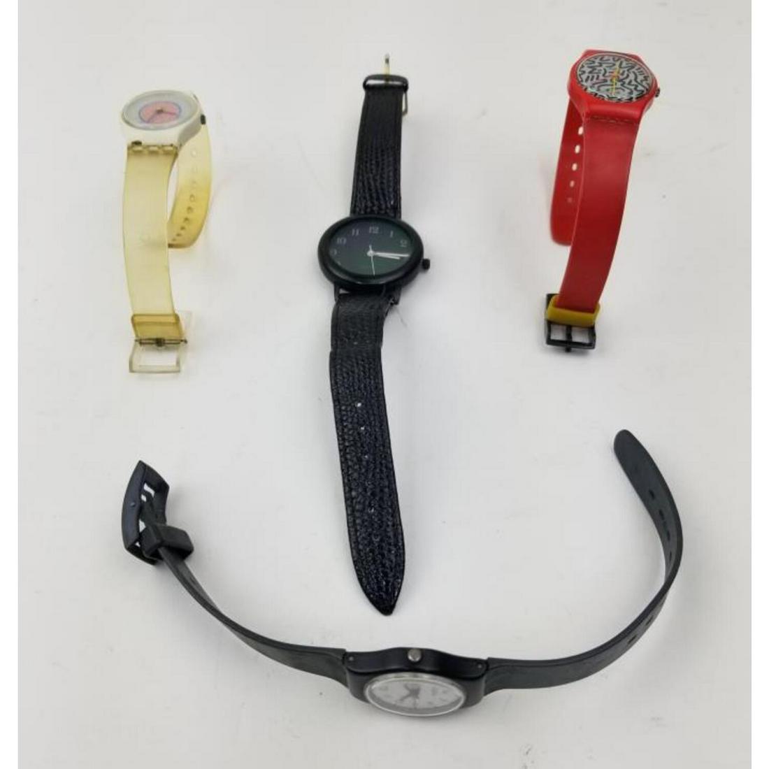Lot of 3 Vintage Swatch Watches: Lot of 3 Vintage Swatch Watches Including 1 After a Design by Keith Haring and 1 Hologram. Total Number of Watches is 4. All Appear to be Circa 1970s. Condition: Generally Good. Please Note: We Cannot