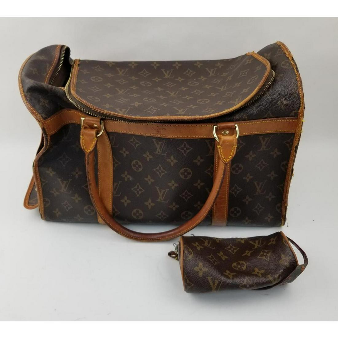 Louis Vuitton Monogram Pet Carrier Bag & 1 Other: Louis Vuitton Monogram Pet Carrier Bag Along w/ a Mini Papillon Pochette Bag.Condition: As Is w/ Wear & Tare. We Cannot Guarantee the Authenticity of Louis Vuitton Bags.Dimensions: Pet Carrier- L-15.5