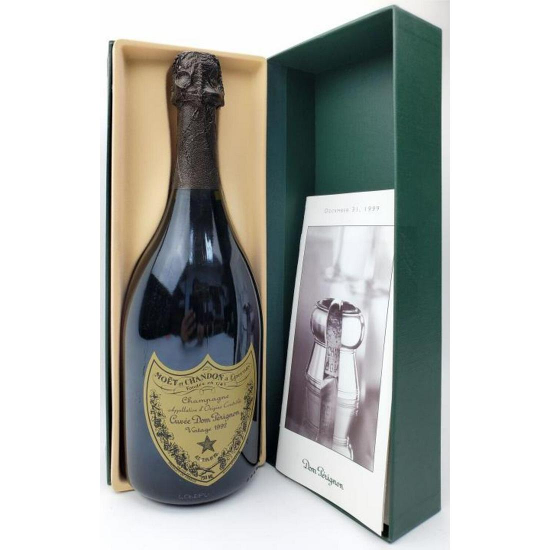 Vintage 1992 Cuvee Dom Perignon: Vintage 1992 Cuvee Dom Perignon Champagne in Original Fitted Box with Pamphlet. Condition: Generally Very Good, Dimensions: Bottle H - 11.75", Box 12.5" x 4.25" x 4"Provenance: From a New Jersey Colle
