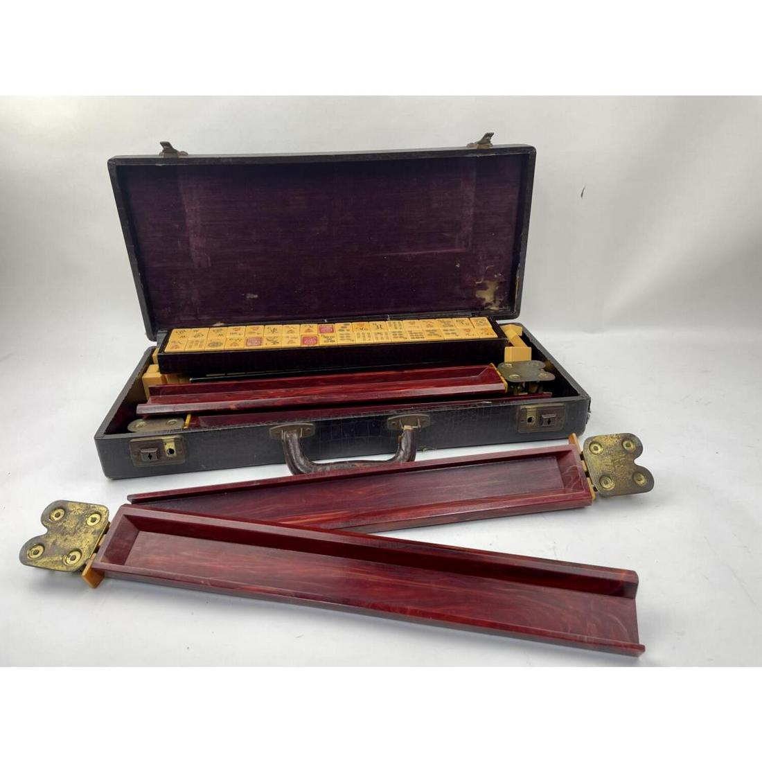 Antique Chinese Mahjong Set in Original Box.: Antique Chinese Mahjong Set in Original Box.Condition: Generally Good, As Is.Dimensions: Box- 19.5" x 9" x 3.5".Provenance: From a Long Island, NY Home.Please note the absence of a condition report do