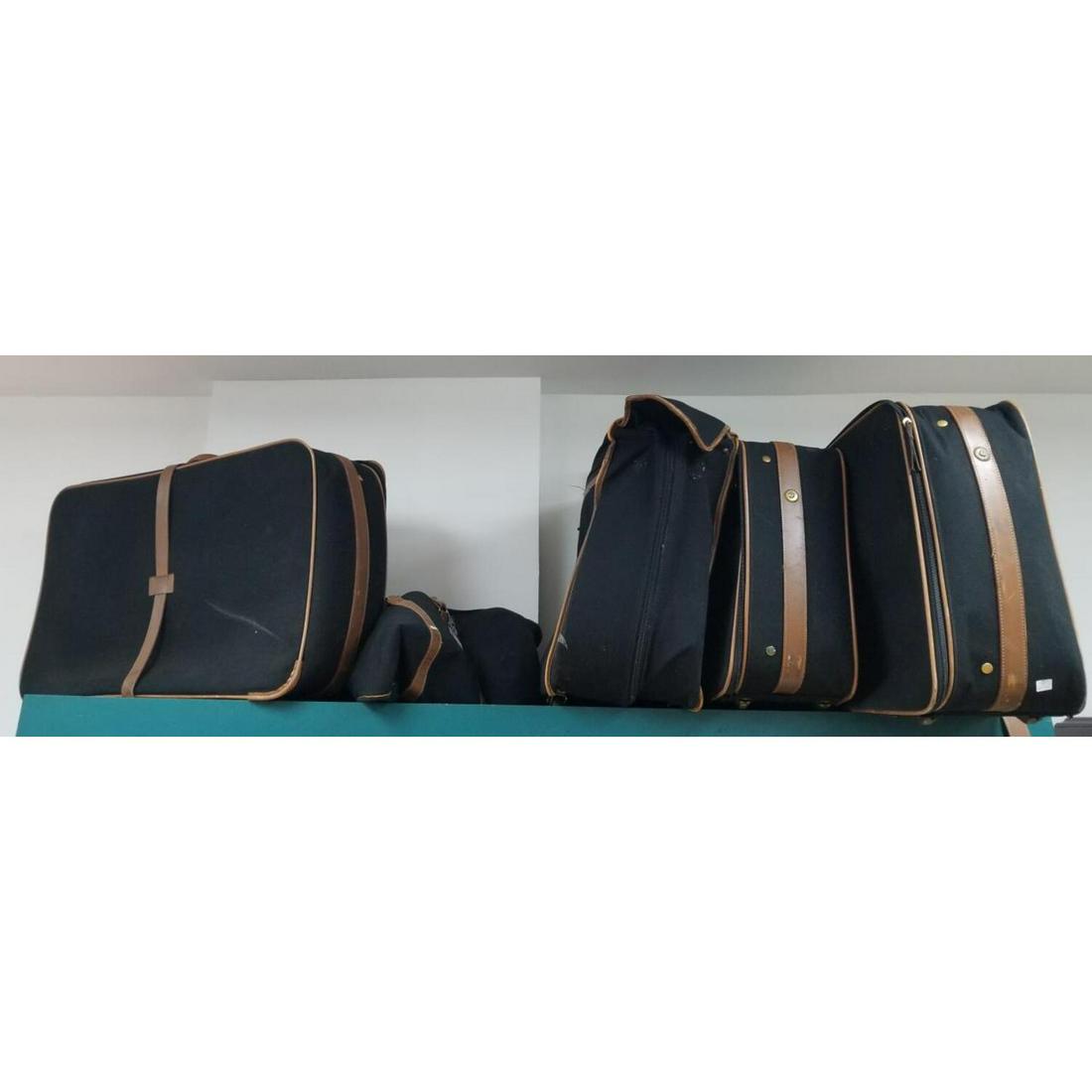 5 Piece Set of T. Anthony Luggage Set: 5 Piece Set of T. Anthony Luggage Set. Condition: As Is. Provenance: From a Long Island, NY Home. Please note the absence of a condition report does not imply that there are no condition issues with t