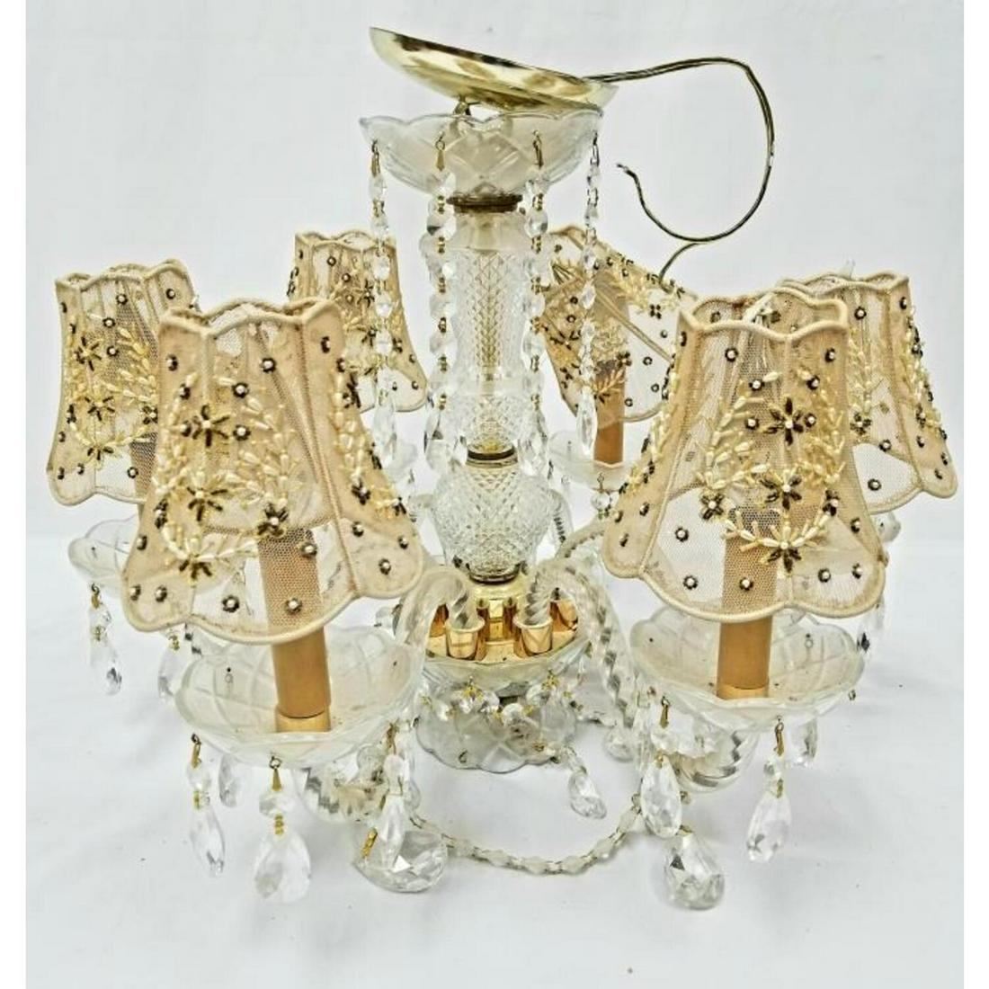 Cut Crystal Chandelier: Cut Crystal Chandelier. Purchased from Safavieh Lighting for over $1000 Originally but Never Used. Condition: Excellent. Dimensions: H (without Chain)- 15", Dia- 18". Provenance: From a Long Island, N