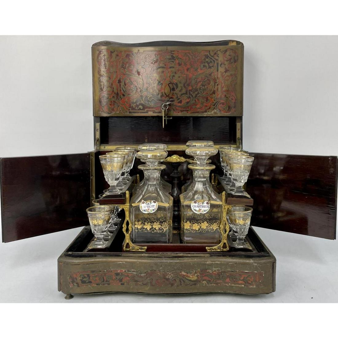 Rare French Marquetry Boulle Tantalus: Rare Antique French Marquetry Boulle Tantalus. Made by Peret of Paris c1855. Contains Glasses, Possibly by Baccarat. Some Glasses are Replacements. Comes with Original Key. Condition: Generally Good, 