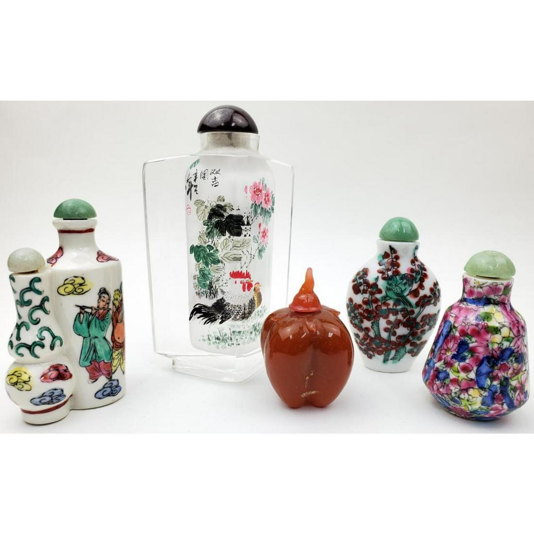 5 Signed Chinese Snuff Bottles.: 5 Chinese Snuff Bottles. Signed. 1 is internally Painted Glass, 1 is Amber Color Glass & 3 Are Porcelain.Condition: All in Generally Good Condition. Dimensions: Tallest- H-4.5". Provenance: From a Lon