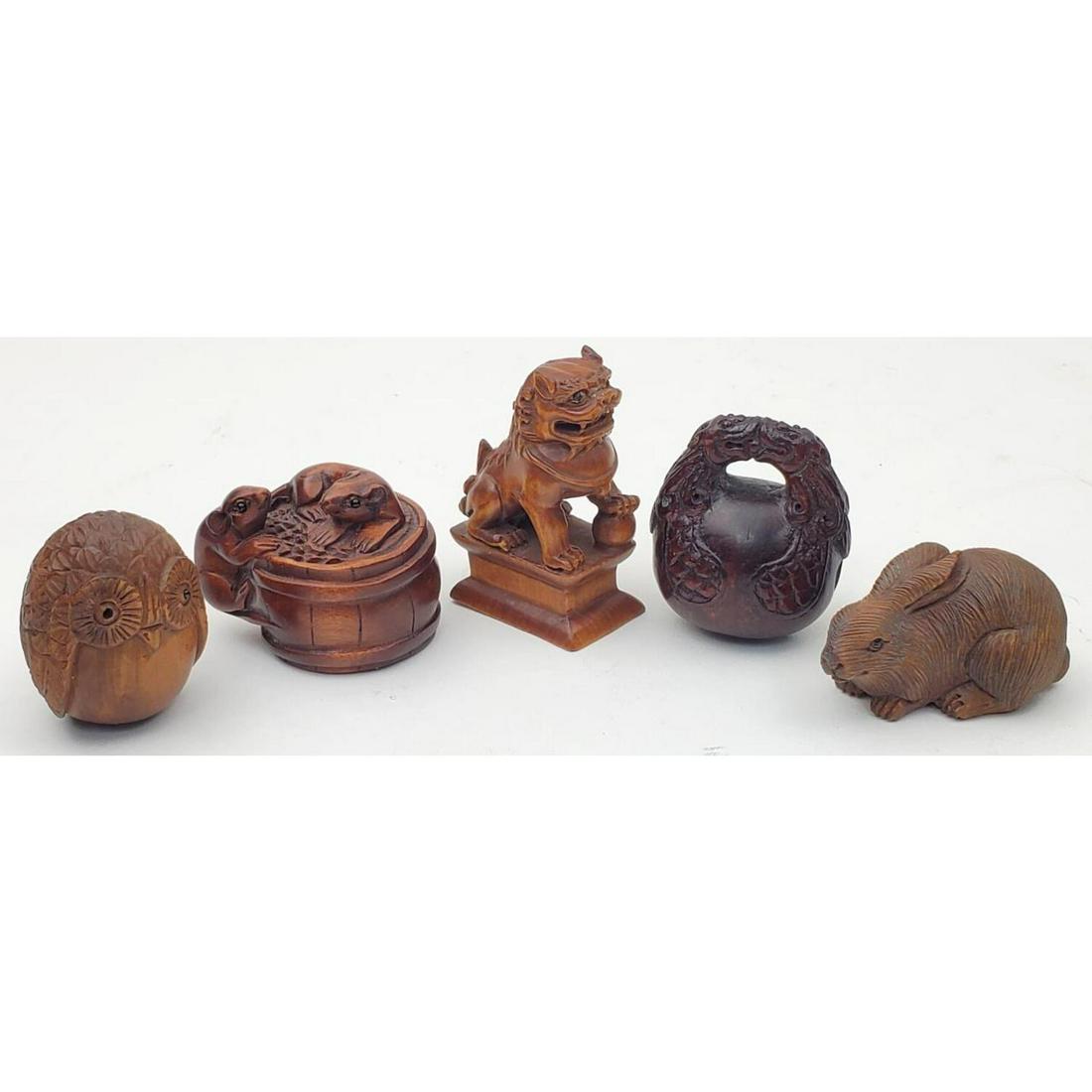Lot of 5 Japanese Carved Wood Netsukes: Lot of 5 Japanese Carved Wood Netsukes in the Shape of Different Animals. Some are Signed. Condition: Generally Good. Dimensions: Largest H- 2". Provenance: From a Long Island, NY Home.Please note the