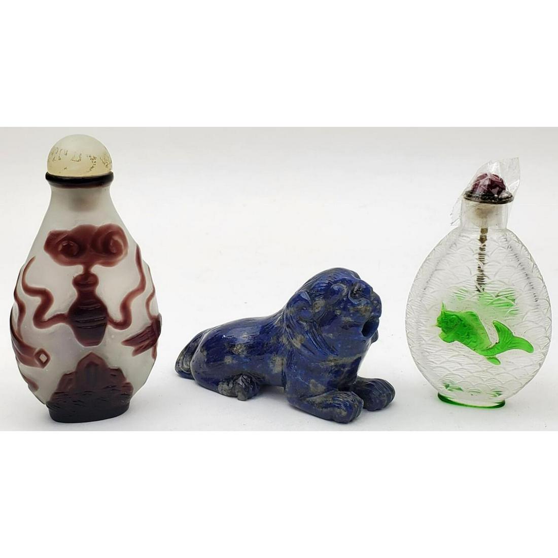 Lot of 3 Chinese Snuff Bottles: Lot of 3 Chinese Snuff Bottles Condition: Generally Good. Dimensions: Largest- 3.25". Provenance: From a Long Island, NY Home. Please note the absence of a condition report does not imply that there a