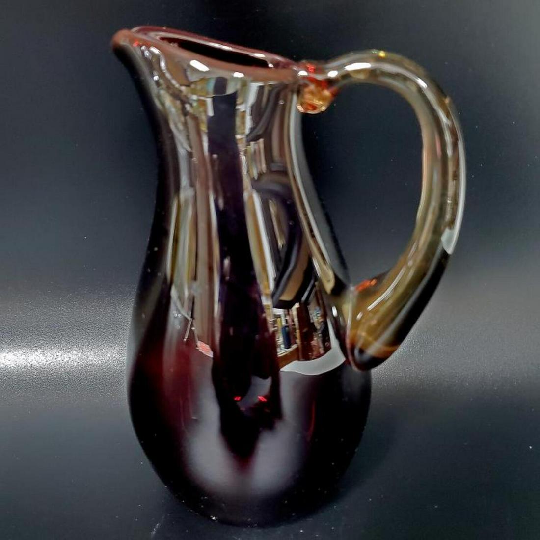 Labino Art Glass Vintage Ruby Red Pitcher: Labino Art Glass Vintage Ruby Red Pitcher. Fully Signed and Dated 1969. Condition: Excellent. Dimension: H- 6.25", Handle to Spout- 4". Provenance: From the Collection of a New Jersey Doctor.Please no