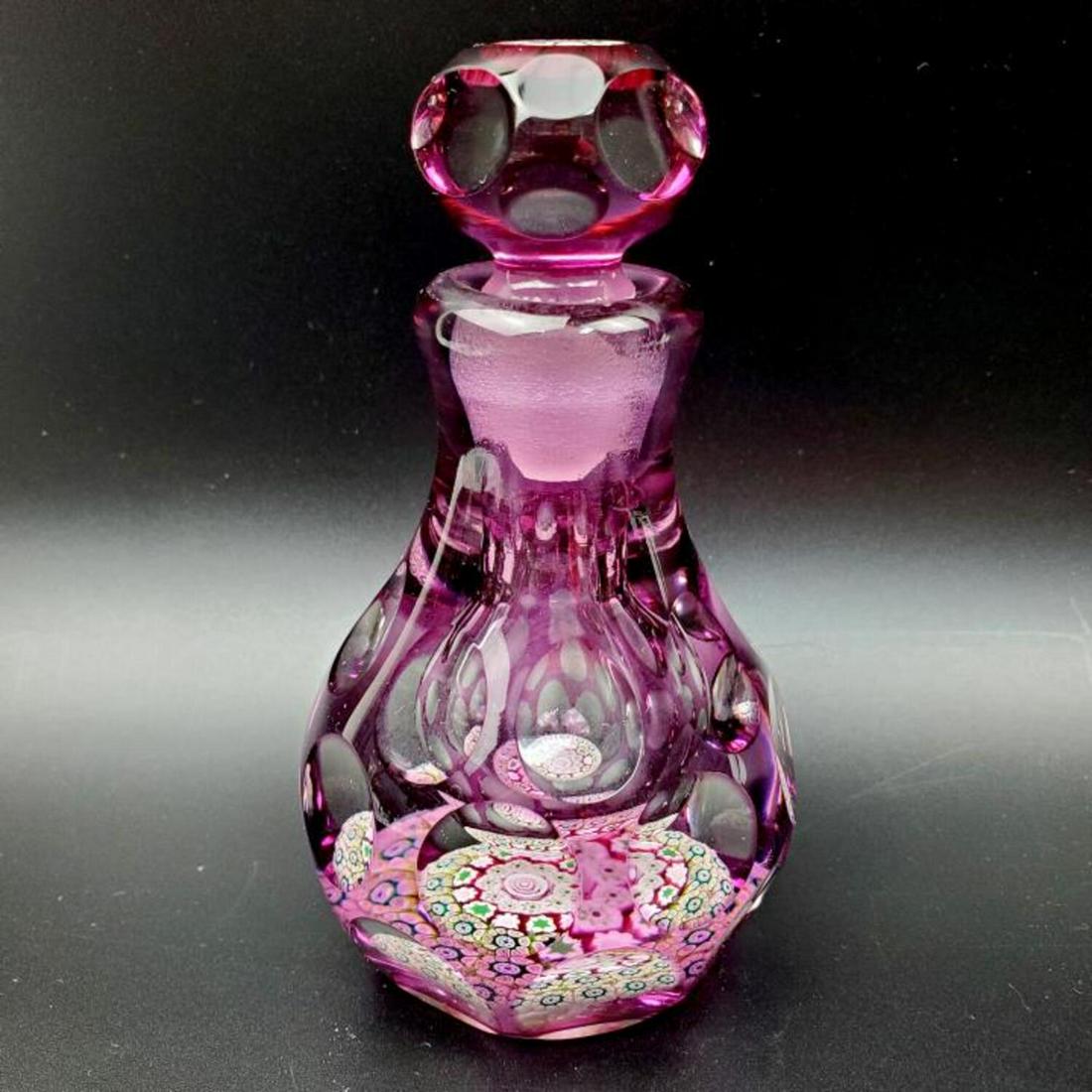 Vintage Pertshire Paperweight & Overlaid Bottle: Vintage Pertshire Paperweights, Crieff Scotland Paper weight and Overlaid Scent Bottle. Condition: Excellent. Dimension: H- 5". Provenance: From the Collection of a New Jersey Doctor.Please note the a