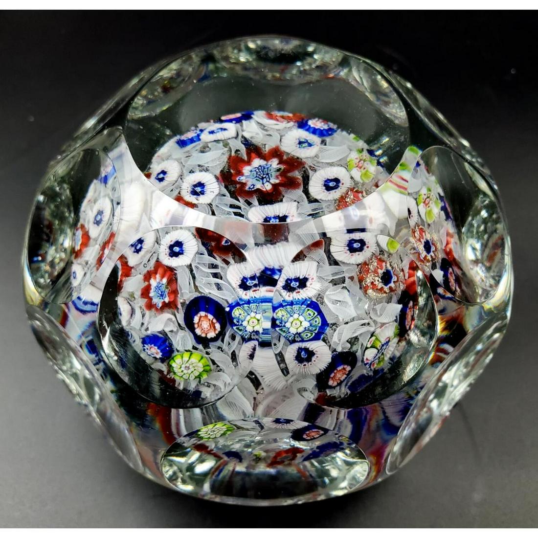 Exceptional Art Glass Paperweight with Millifiori: Exceptional Large Art Glass Paperweight with Milliefiori Decorations and Cut Glass Sides and Top. Condition: Excellent. Dimension: Dia- 4", H- 3.25". Provenance: From the Collection of a New Jersey Do