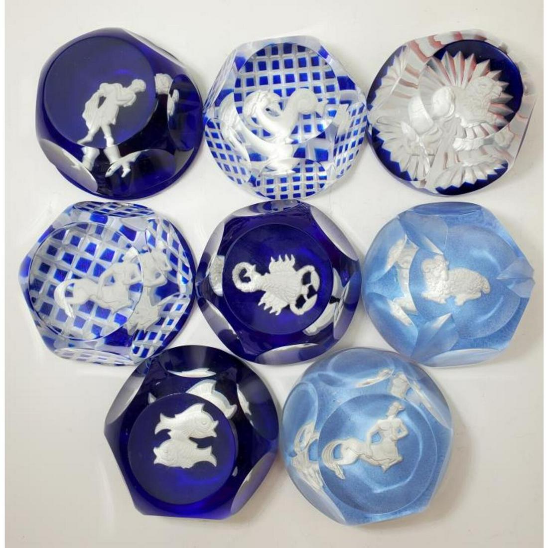 8 Baccarat Zodiac / Astrology Sulfide Paperweights: Lot of 8 Baccarat Zodiac / Astrology Signs Sulfide Paperweights. Various Colors of Blue. All Signed. Condition: Generally Very Good. Dimension: Dia- 2.75", H- 1.5". Provenance: From the Collection of 