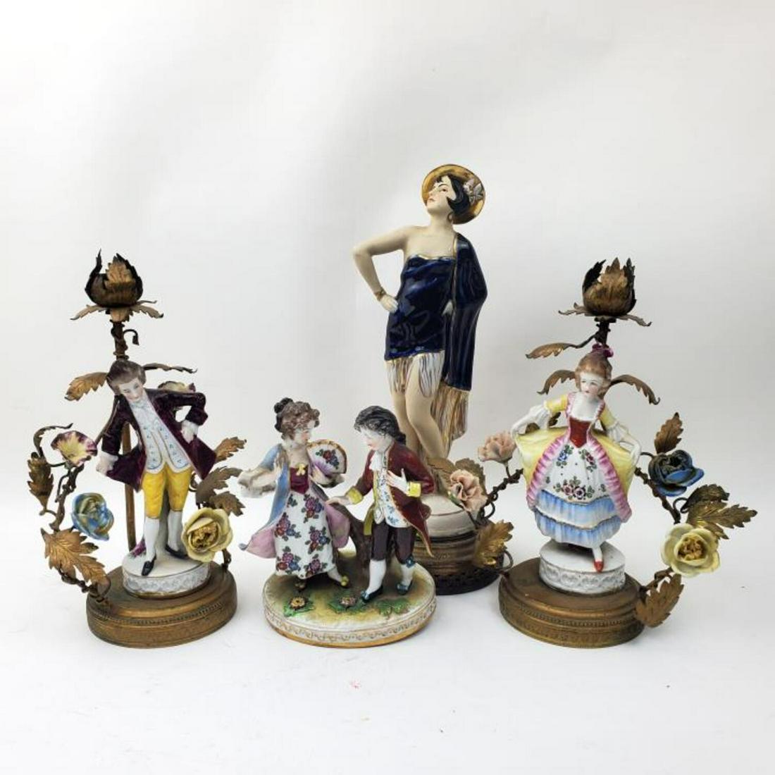 Lot of 4 Antique Continental Porcelain Items: Lot of 4 Antique Continental Porcelain Items Including a Pair of Candle Sticks, 1 Figurine & a Tall Art Deco Figurine. Condition: All Appear to be in Very Good Condition.Dimensions: Tallest- H-11.5"Pr