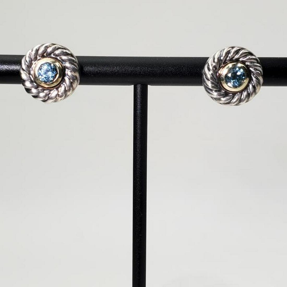 David Yurman Pair Sterling & Gold Earrings: David Yurman Pair of Sterling Silver and Gold Earrings with Aquamarine Stones. Condition: Excellent. Weight: 6 g. Provenance: From a Long Island, NY Home. Please note the absence of a condition report