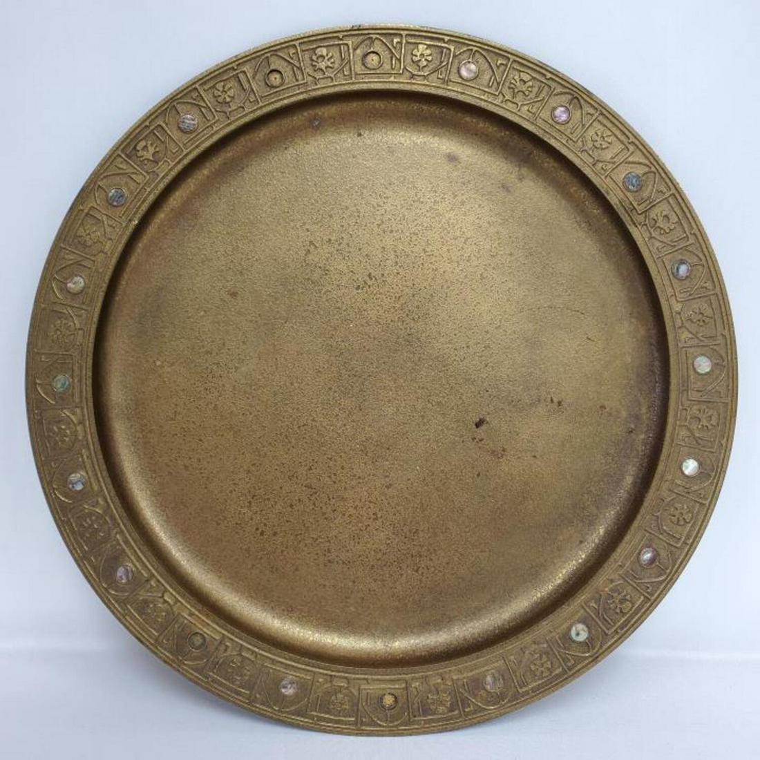 Tiffany Studios Bronze and Mother of Pearl Tray: Tiffany Studios Bronze and Mother of Pearl Tray. Fully Marked and Numbered 1730. Condition: Generally Good. Missing 4 Mother of Pearl Inserts, Some Oxidation. Dimension: Dia- 11". Provenance: From a N