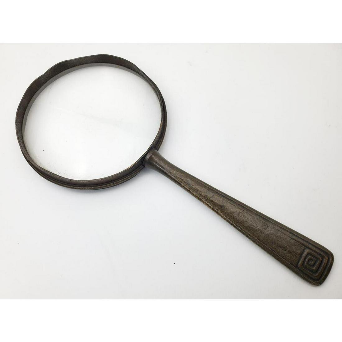 Tiffany Studios Magnifying Glass: Tiffany Studios Magnifying Glass. Fully Marked. Condition: Generally Good. Minor Chip to the Glass, Minor Dents, and Very Little Oxidation. Dimension: L- 8.4", Dia- 3.4". Provenance: From a New Jersey