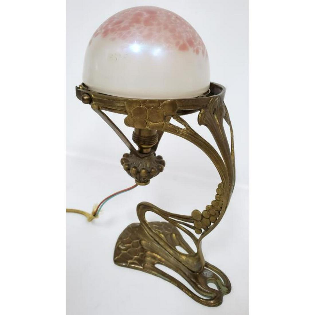 Unusual Loetz Art Nouveau Cantilever Lamp: Unusual Loetz Art Nouveau Cantilever Lamp.Condition: Excellent. Dimensions: H- 10". Provenance: From a Private Pennsylvania Collection. Please note the absence of a condition report does not imply tha