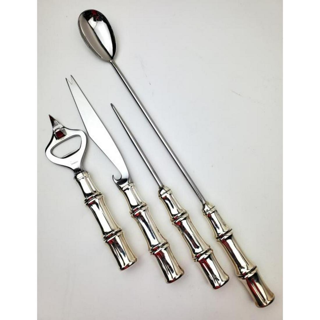 Tiffany & Co Silver Handled Bamboo Pattern Bar Set: Tiffany & Co. Sterling Silver Handled Bamboo Pattern Piece Bar Set. In Original Tiffany Pouch.Condition: Excellent.Dimensions: Tallest 11.75".Provenance: From a Queens, NY Home.Please note the absence