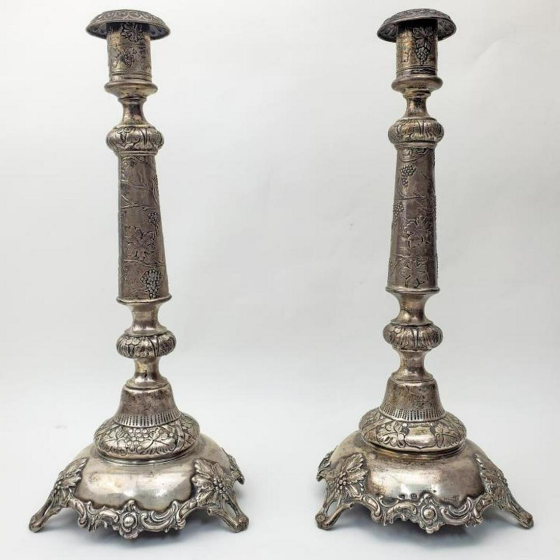 Russian Antique Pair of 84 Silver Candlesticks: Russian Antique Pair of 84 Silver Ornate Candlesticks. Fully Hallmarked and the Maker Mark I.SZEKMAN.Condition: Excellent.Dimensions: H- 14.5". Total Weight: 23.6 ozt / 734 gr.Provenance: From a Long