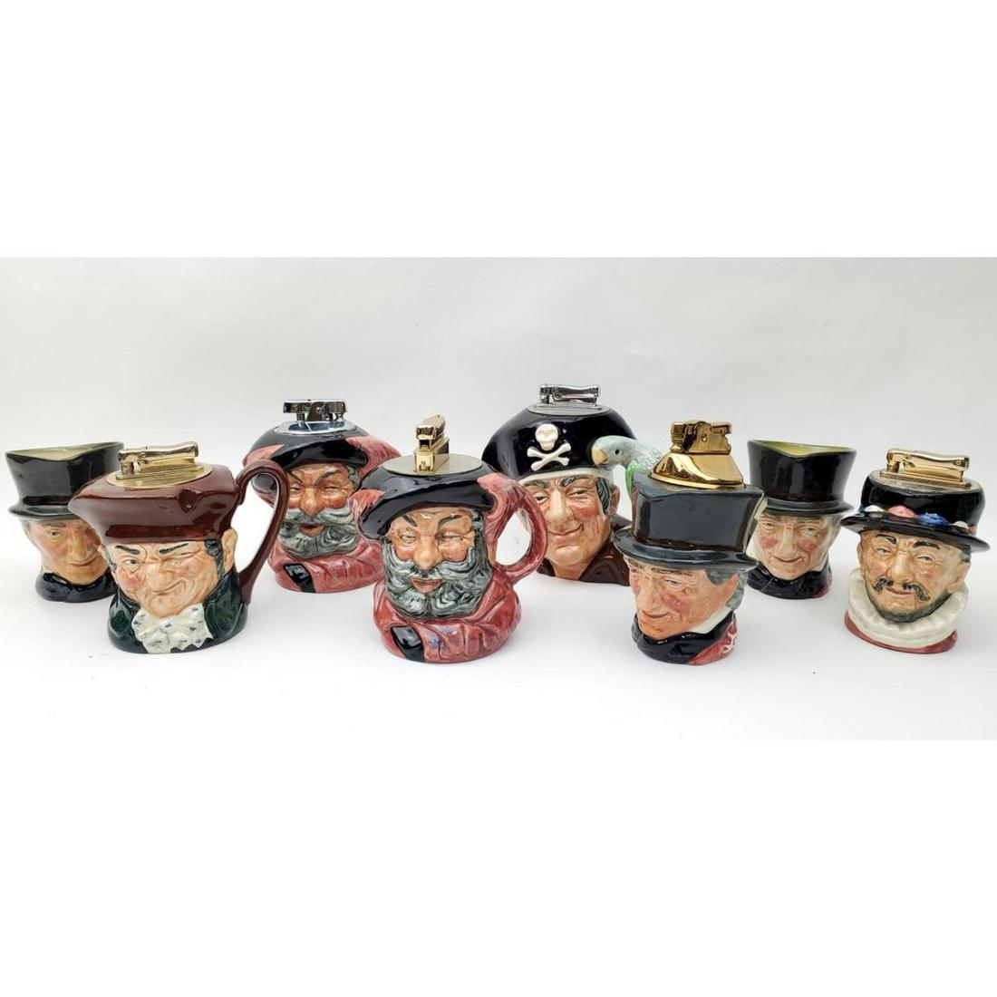 Royal Doulton Porcelain Items: Vintage Royal Doulton Porcelain Items including 6 Lighters and 2 Mugs.Condition: Generally Very Good.Dimensions: Tallest Height 4.5"Provenance: From a Long Island, NY HomePlease note the absence of a 