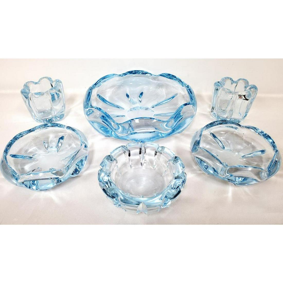 Orrefors 6 Vintage Lot Blue Moonlight Glass Items: Orrefors 6 Piece Vintage Lot of Blue Moonlight Glass Items Including a Large Bowl, 3 Small Bowls, and 2 Small Vases. Condition: All Generally Good. Dimensions: Dia- 10", H- 3". Provenance: From a New