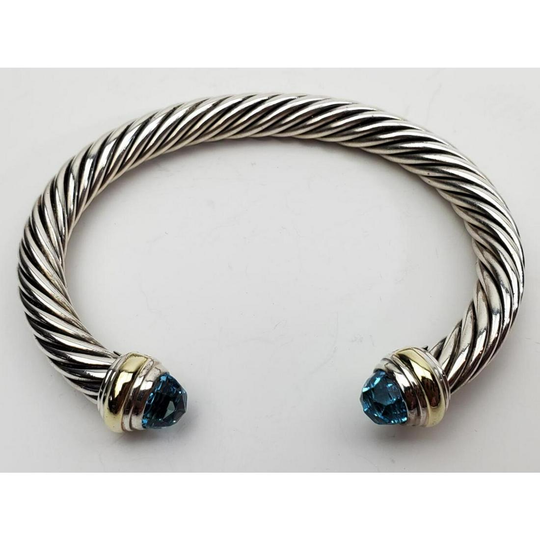 David Yurman 14K and Silver Bracelet Aqua Stone: David Yurman 14K and Silver Bracelet Aqua Stone.Condition: Excellent.Dimensions: Diameter 3". Width .25".Total Weight: 27.9 dwt / 43.4 gr.Provenance: From a Long Island, NY Home.Please note the absenc
