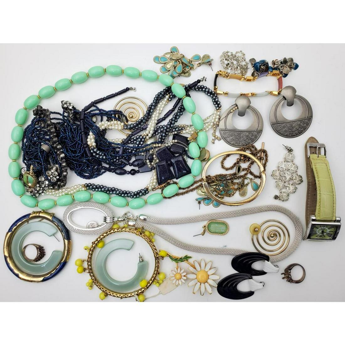 Lot of Costume Jewelry: Lot of Costume Jewelry Including Trifari, Weiss ect. Condition: As Found. Dimensions: Various Sizes. Provenance: From a Long Island, NY Home. Please note the absence of a condition report does not imp